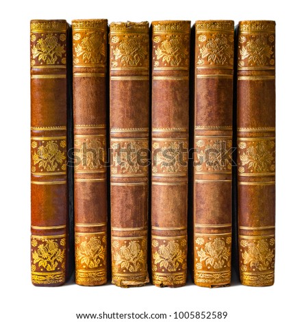 Old vintage closed books in a row, isolated on a white background (design element)