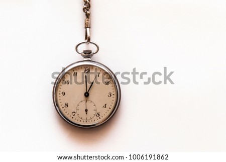 A pocket watch on white background.