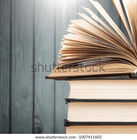 Stack books open in the library