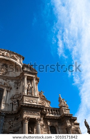 Part of facade of catholic cathedral  with columns in Spain.Architecture of baroque and renaissance style.