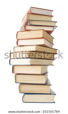 Old antique books pile isolated on white background