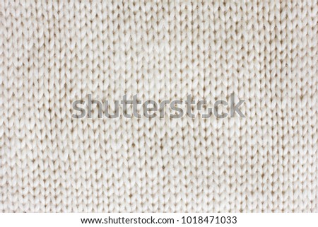 White Knitted Wool Background. 
