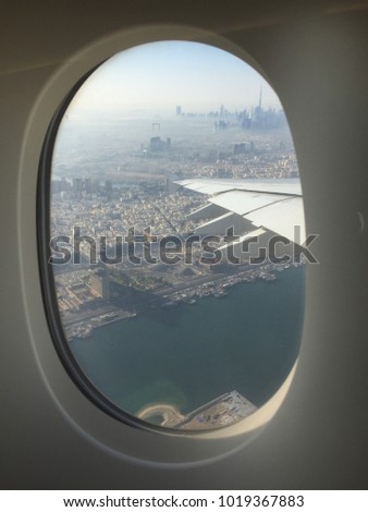 of Dubai views from aeroplane windows during sunny day
