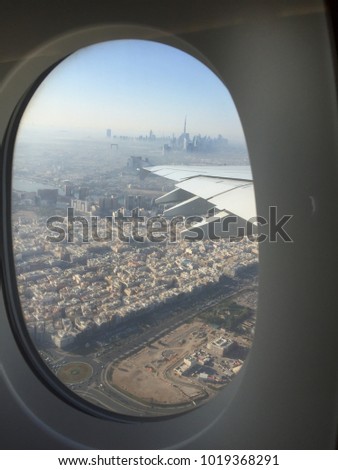of Dubai views from aeroplane windows during sunny day