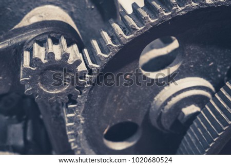 metallic gears, closeup, of vintage machine - mechanical technology concept -
