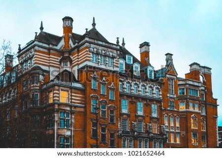 majestic orange brick building in the heart of london