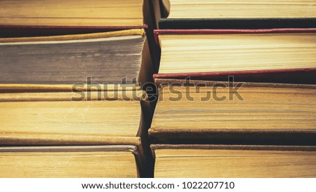 stack of old books background.