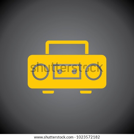 Yellow cassette player icon on black background.