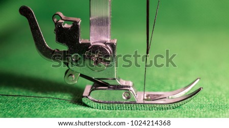 Detail of the leg of a sewing machine
