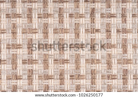 close up of a woolen fabric of beige color. Abstract background, empty template. Top view.