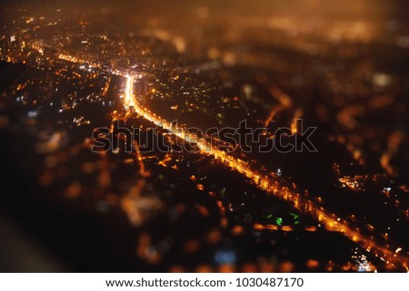 Night Kiev from a height view from the plane. Tilt Shift Effect
