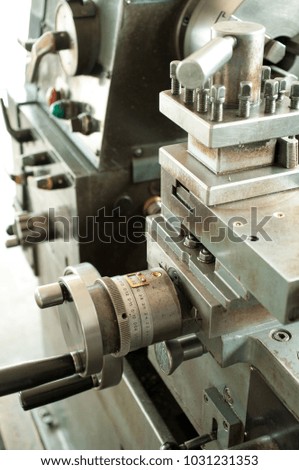 Lathe machine cross slide with handwheel and tool post, vertical orientation
