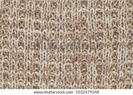 Rib-knit jumper fabric background. Knitted pullover background , close up. 