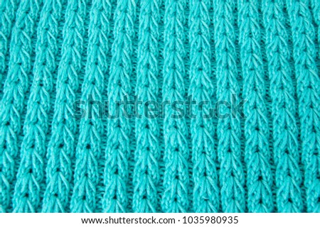 knitted pattern of blue thread