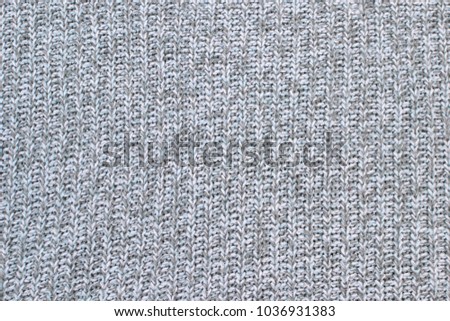 Textile texture grey color, knit sweater 
