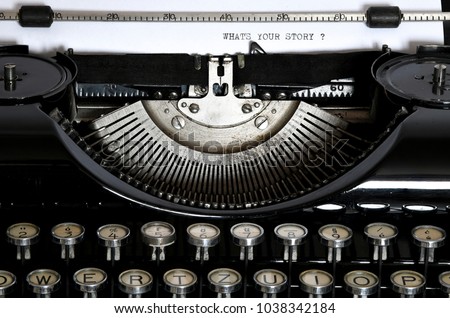 An old typewriter with the text What's your Story - so how is your story?
