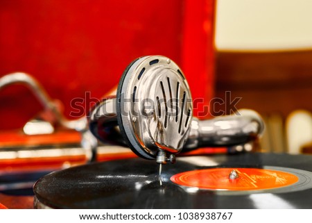 Ancient vintage gramophone, playing head, plate