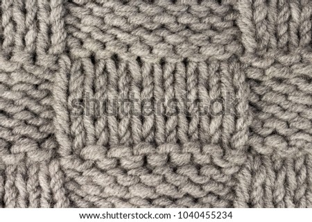 Knitting. Gray knit fabric texture background or knitted pattern background