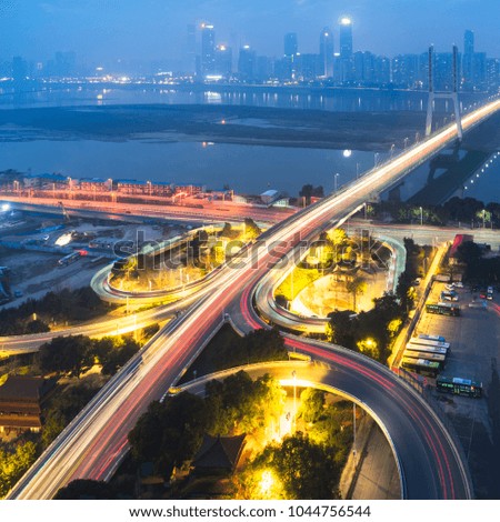 night view of busy traffic in Nanpu overpass,elevated view,Shanghai,China.