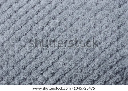 Gray background of a piece of woolen cloth