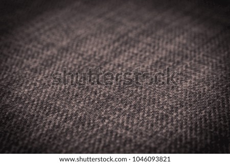 Gray fabric texture. Abstract background, empty template. Selective focus.