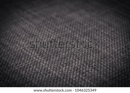 Gray fabric texture. Abstract background, empty template. Selective focus.
