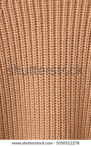 Close up female sweater texture
