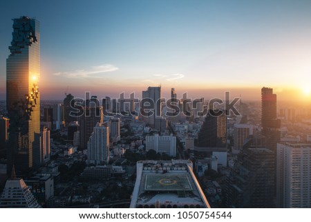 Top view of modern building in Business district at Bangkok city with skyline at twilight,Thailand.