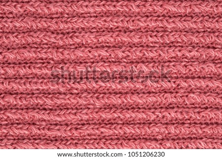 pink knitted fabric texture.