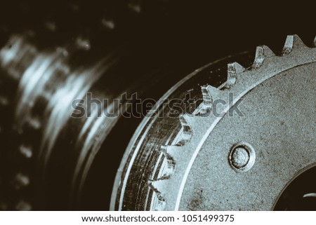 Monochrome background image of gear close up. Artwork from auto part in macro photography.