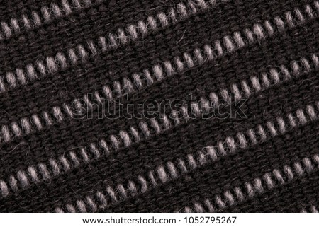 close up of black fabric stitch