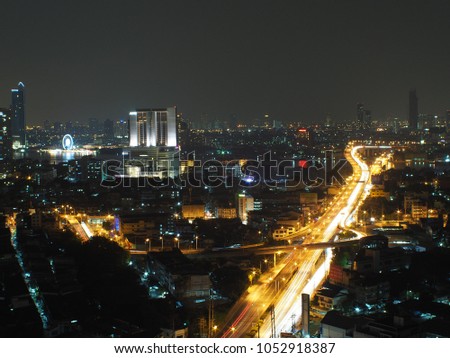 The bangkok city night view, condo and modern buildings in the business zone of bangkok. this is a capital city of thailand and famous city of tourist.