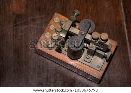 The old telegraph on wooden table