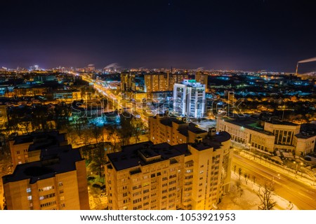 Night Voronezh aerial cityscape from rooftop. Modern buildings in Moscow prospect.