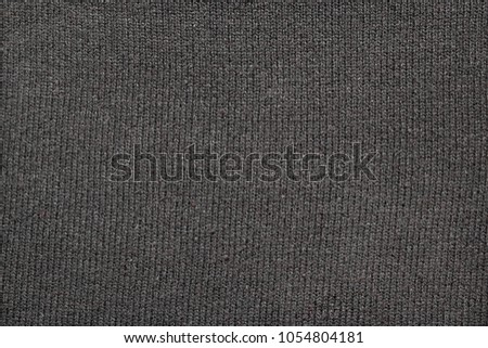 texture of gray knitted fabric, close-up, top view