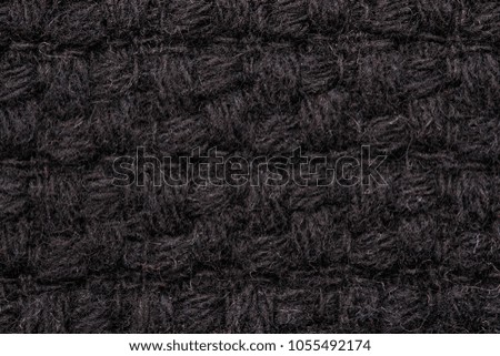black woolen fabric texture.