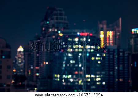 Blurred abstract background aerial view of Bangkok  city night lights colorful bokeh in cool vintage