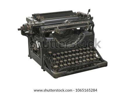 Old rusty typewriter isolated on white background