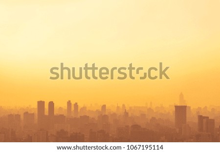City silhouette against the sky on a sunset