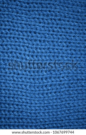 Knitted petrol colored wool 