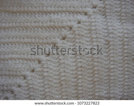knitting wool texture background. knitted fabric texture. Knitted jersey background with a relief pattern. Crochet. copy space