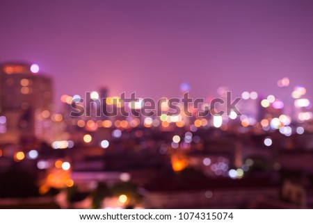 Abstract urban night light bokeh defocused background, city night