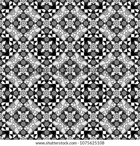 Seamless pattern in white, gray and black colors. Background with tiles and rhombus. Geometrical seamless ornament.