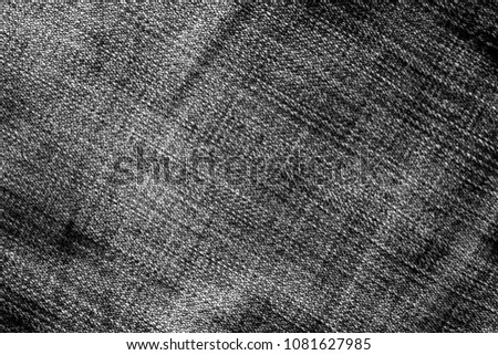 Jeans texture with blur effect in black and white. Abstract background and texture for design.