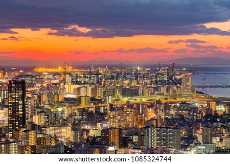 Osaka city night aerial view with beautiful sunset skyline background, cityscape central business downtown