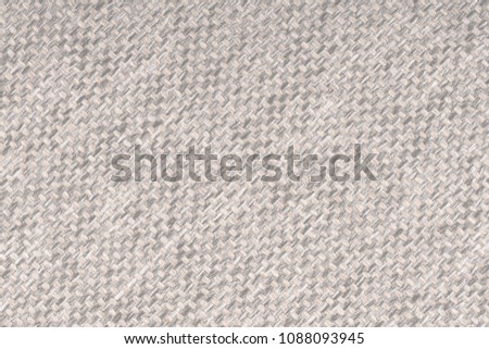 close up of a woolen fabric of brown color. Abstract background, empty template. Top view.
