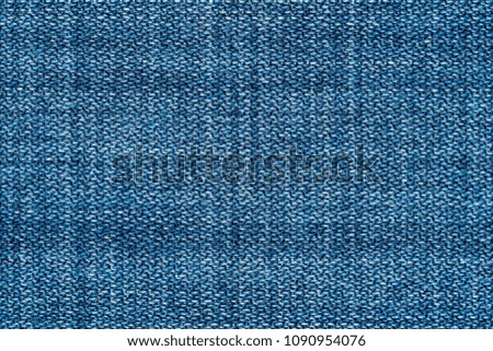 background and texture of denim or jeans fabric closeup