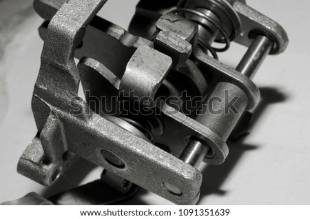 detail for the repair of a machine, a product made of metal, a spare part on a white background,