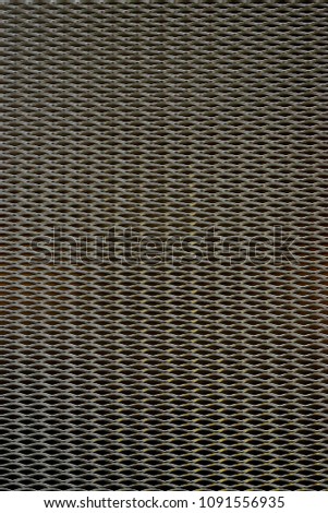 Front portrait view of a metal fence as seamless textured background with strong geometry and texture and space for copy