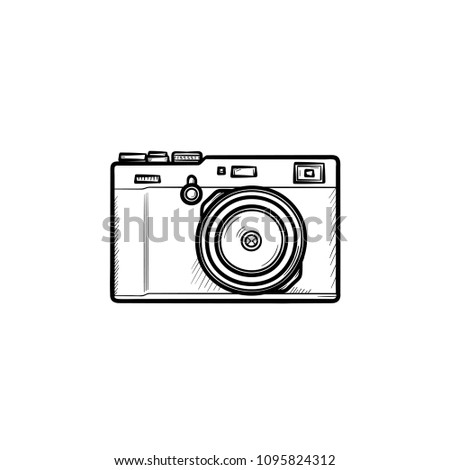 Simple camera hand drawn outline doodle icon. Vintage photocamera with lens and flash vector sketch illustration for print, web, mobile and infographics isolated on white background.